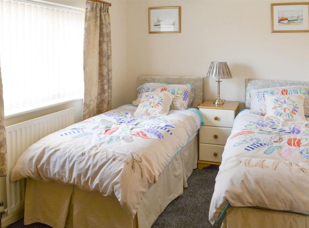Light and airy twin bedroom at Seashore Hideaway in Newbiggin-by-the-Sea, Northumberland