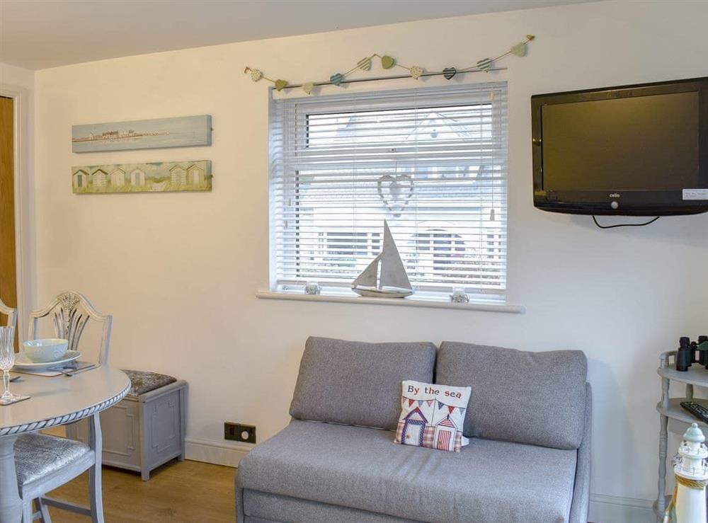 Dining room at Seaside Cottage in Benllech, Anglesey, Gwynedd