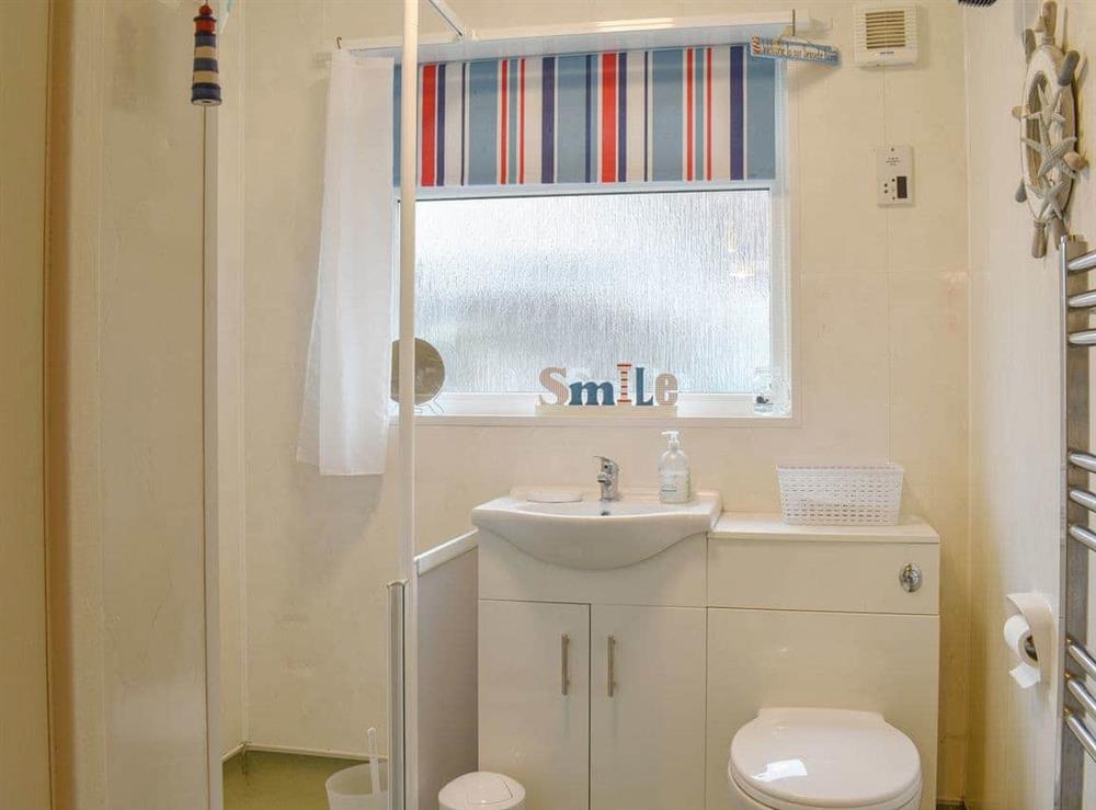 Shower room at Seaside Cottage in Benllech, Anglesey, Gwynedd