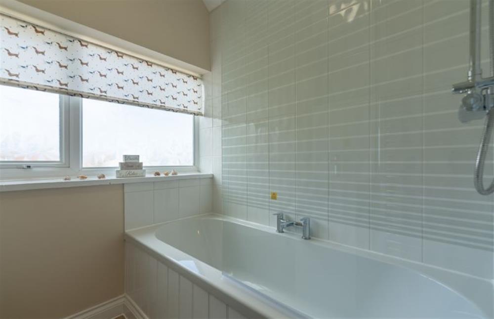 First Floor: Bathroom with bath and shower over at Seaside Cottage, Wells-next-the-Sea
