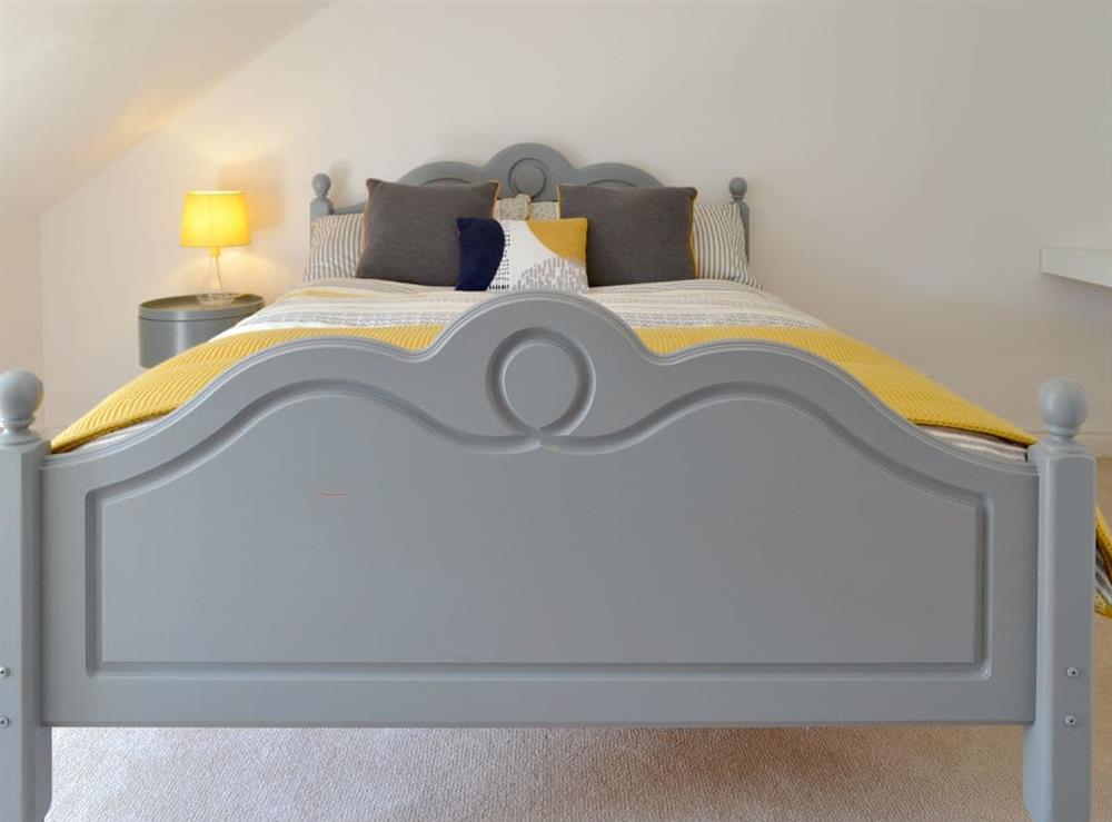 Comfortable double bed within family bedroom at Seaside Mews in Cromer, Norfolk