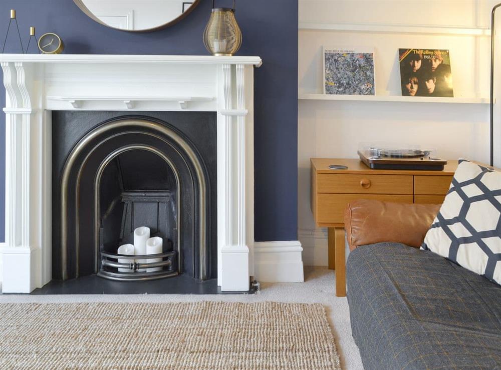 Feature fireplace within living room at Seaside Mews in Cromer, Norfolk