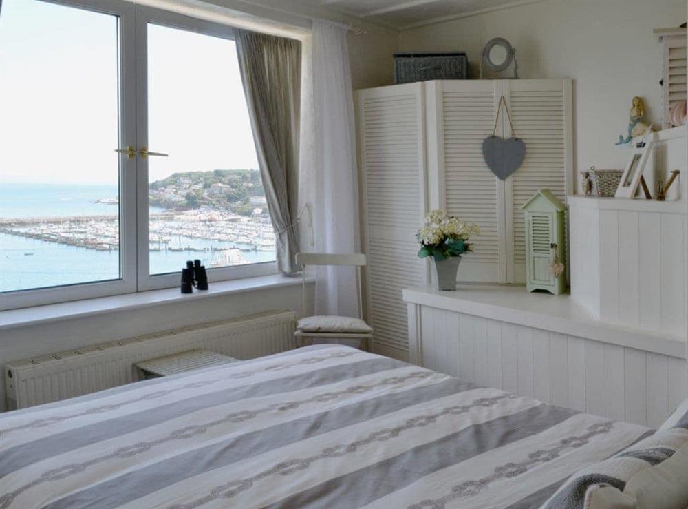 Double bedroom with stunning views across the bay at Seaside Stories in Brixham, Devon