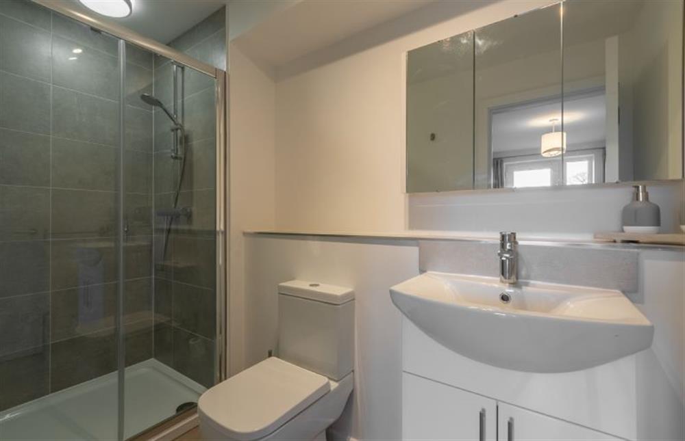 Ground floor: En-suite to master bedroom with large walk-in shower, WC and wash basin at Seastiles, Salthouse near Holt
