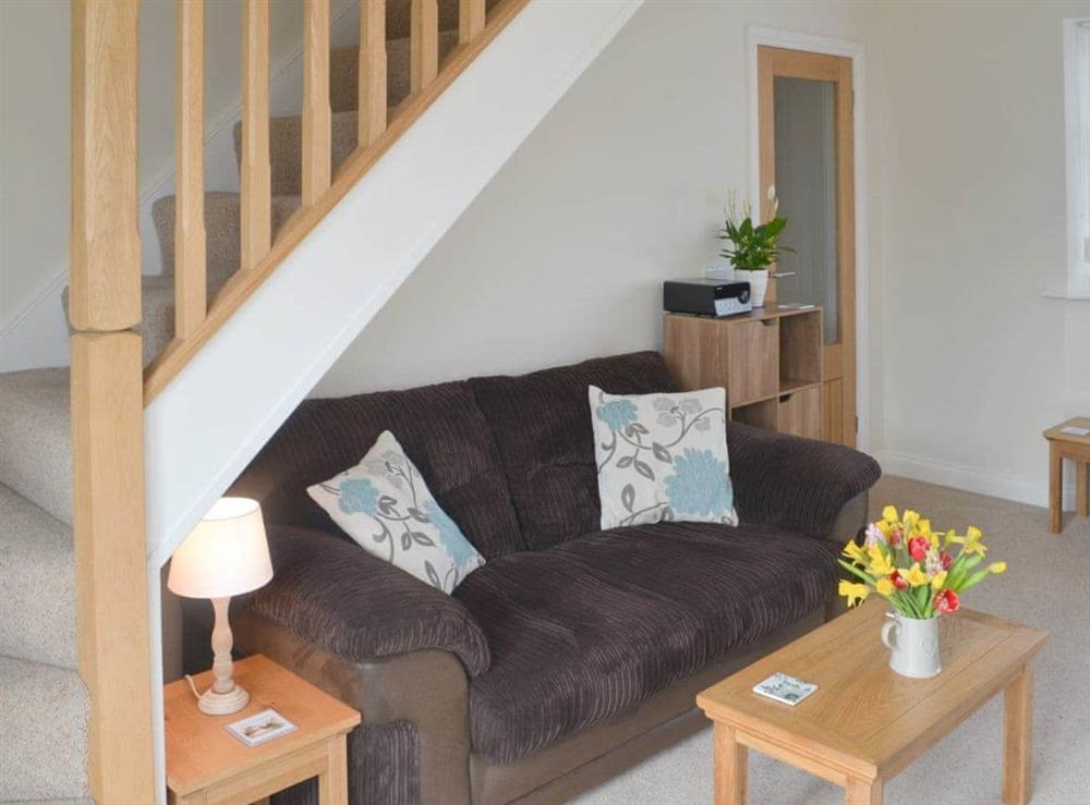 Comfy seating within living room at Seatoller in Kettleness near Whitby, North Yorkshire