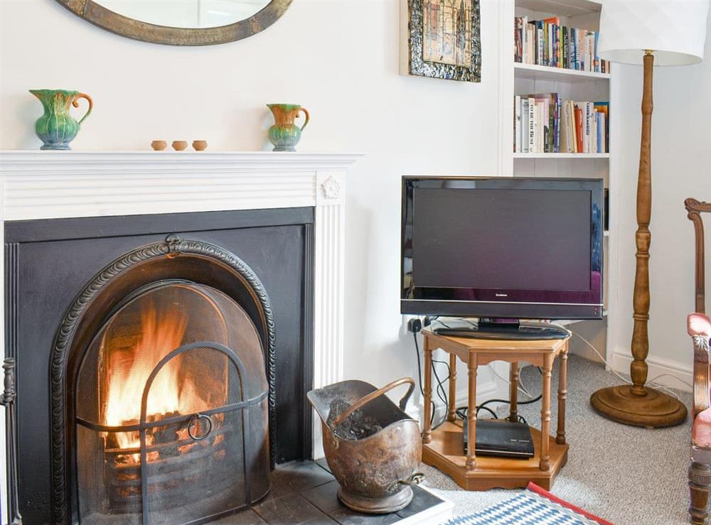 Open-fire within the living room at Seaton Cottage in Collieston, near Ellon, Aberdeenshire