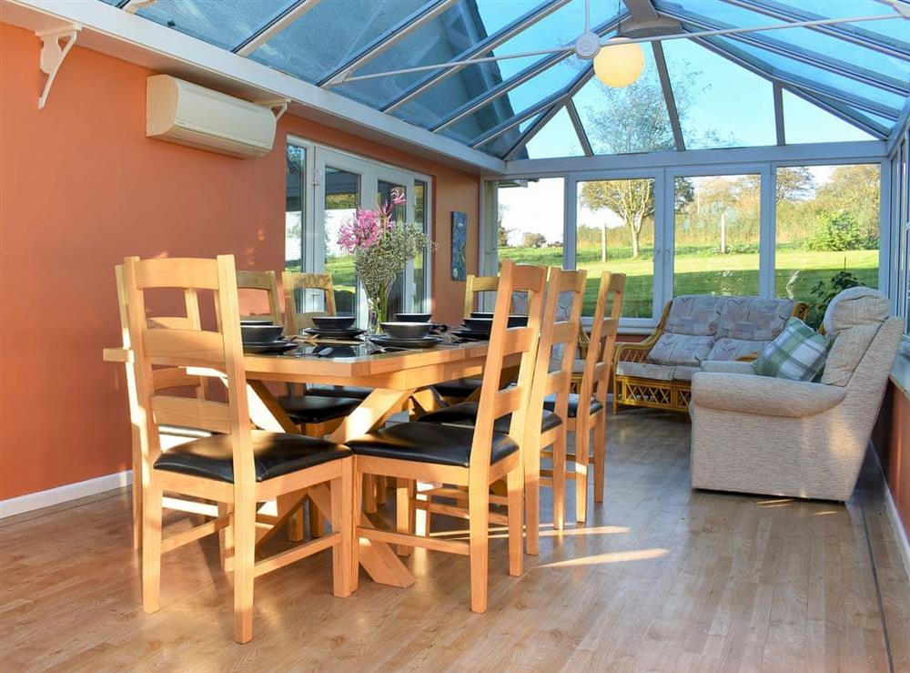 Conservatory (photo 2) at Seaview Bungalow in Membury, near Axminster, Devon