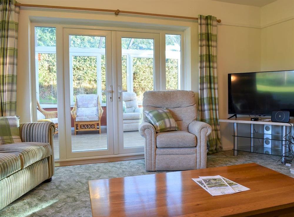 Living room at Seaview Bungalow in Membury, near Axminster, Devon