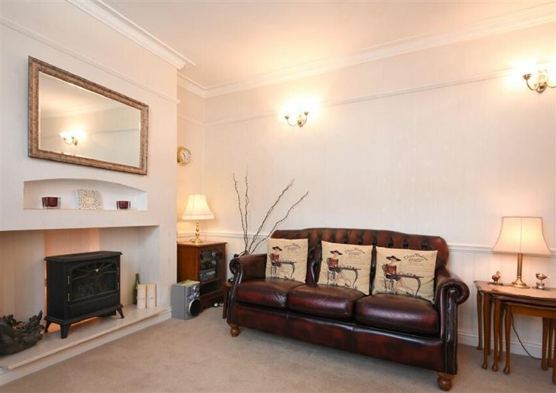 Relax in the living area at Seaview Cottage, Amble