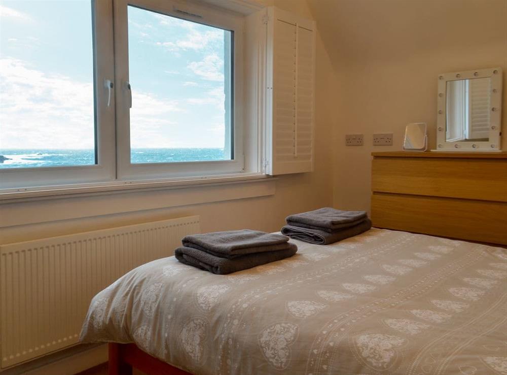 Double bedroom with sea view (photo 2) at Seaview Cottage in Ellenabeich, near Oban, Argyll