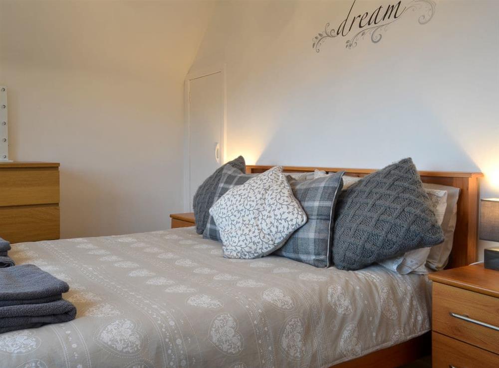 Double bedroom with sea view at Seaview Cottage in Ellenabeich, near Oban, Argyll