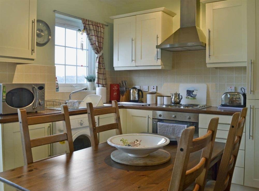 Attractive kitchen/dining room at Seaview Cottage in Garlieston, Dumfries and Galloway