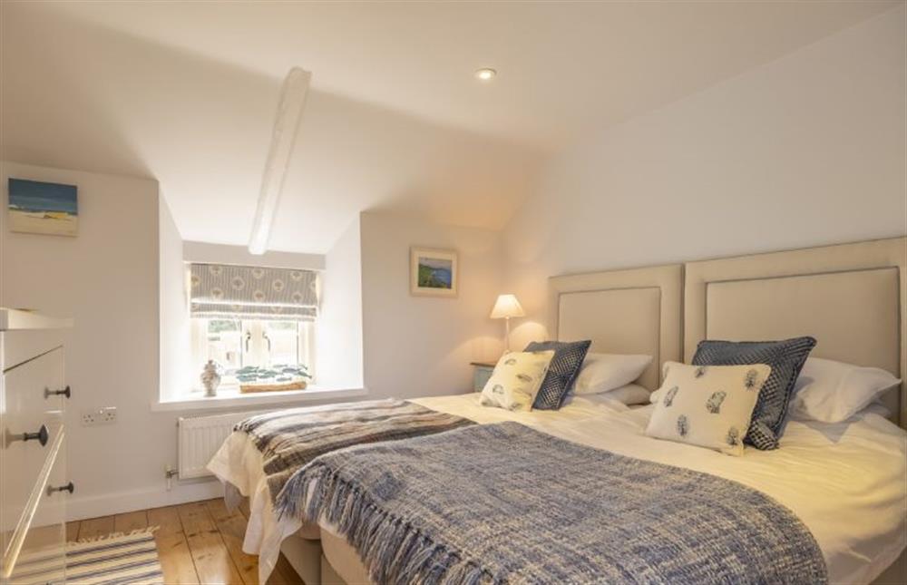 Master bedroom with 3’ twin beds side-by-side at Seaview Cottage, Old Hunstanton