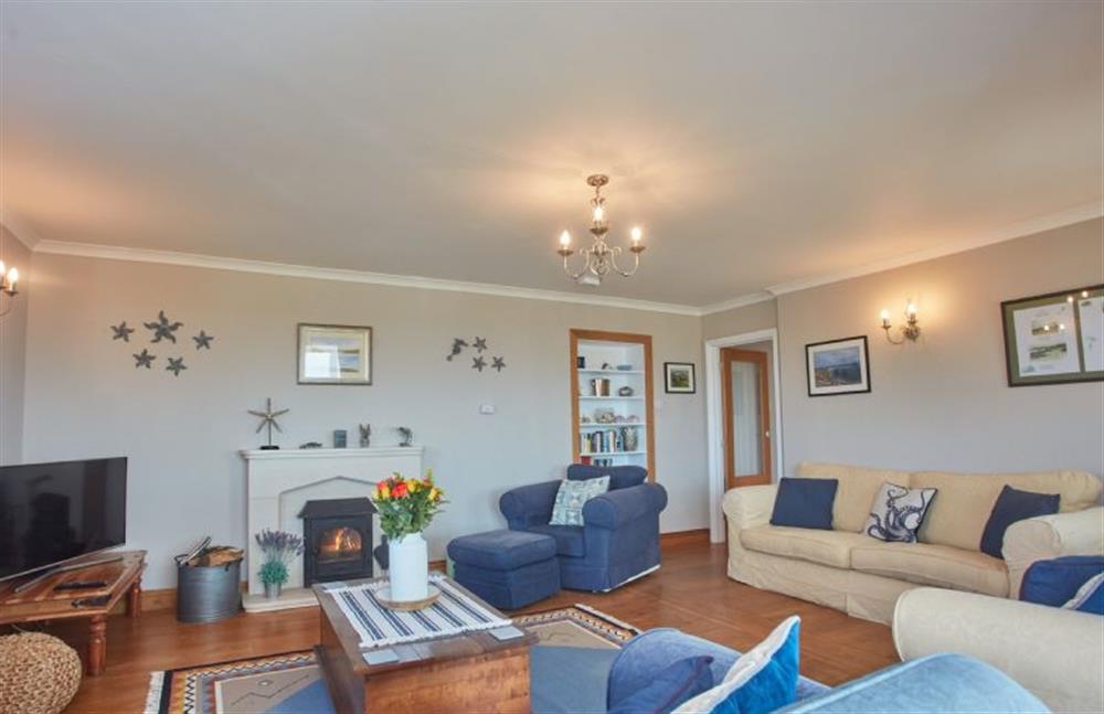 Ground floor: Sitting room with wood burning stove and Smart television at Seawynds, Trelights Near Port Isaac