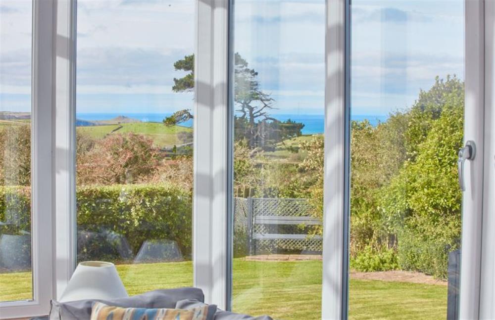 Ground floor: Views overlooking the garden and distant sea views at Seawynds, Trelights Near Port Isaac