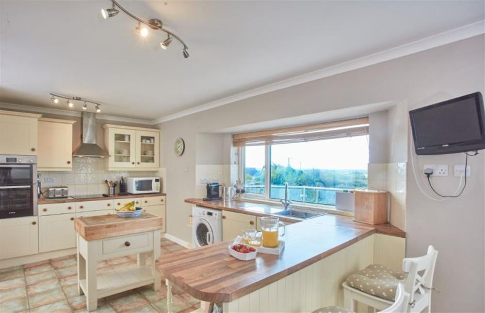 Ground floor: Well-equipped kitchen with breakfast bar, dishwasher and television at Seawynds, Trelights Near Port Isaac