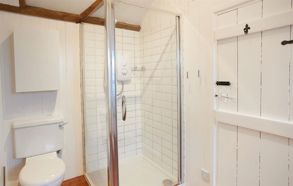 En-suite bathroom with bath and separate shower (photo 2) at Seekings Cottage, Knowstone