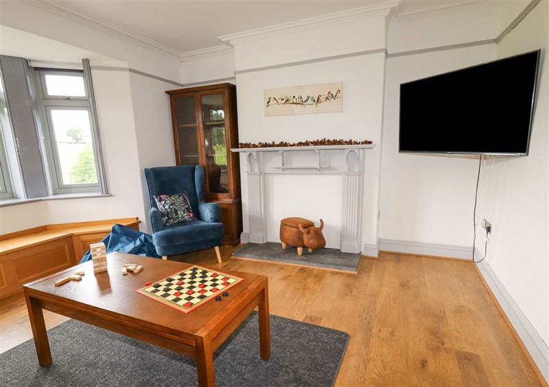Relax in the living area at Segrwyd Uchaf, Denbigh