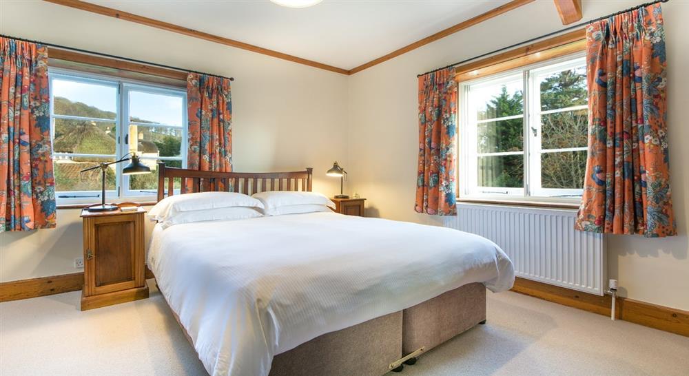 One of the double bedrooms at Selworthy Farmhouse in Holnicote, Somerset