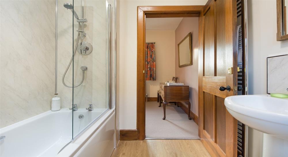 One of the en suite bathrooms at Selworthy Farmhouse in Holnicote, Somerset