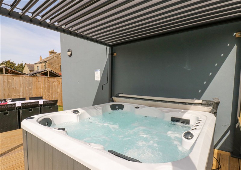 Enjoy the hot tub at Seraphim House, St Johns Chapel