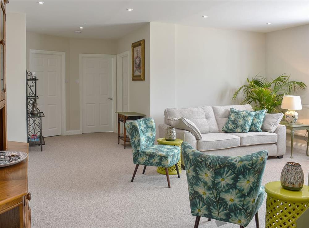 Spacious living room at Serendipity in West Parley, near Bournemouth, Dorset