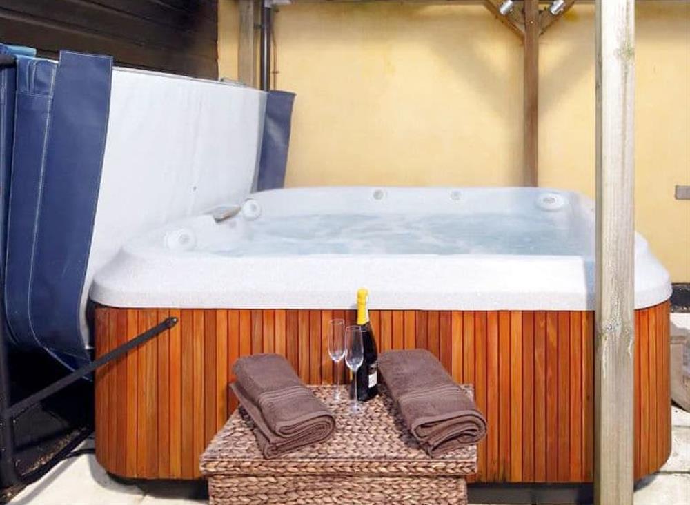 Private hot tub (photo 2) at Oak Cottage, 