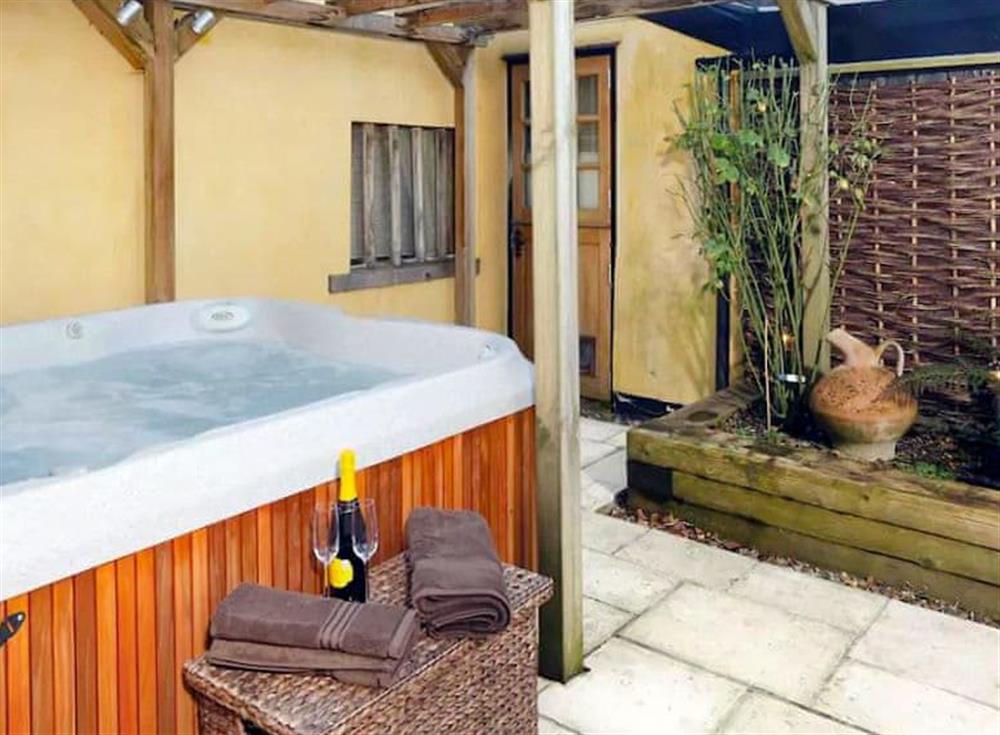 Private hot tub (photo 3) at Oak Cottage, 