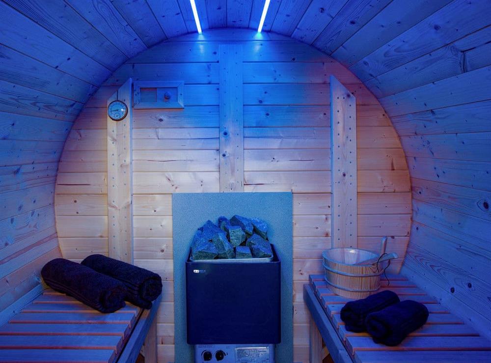 Relaxing barrel-style Swedish sauna (photo 3) at Oak Cottage, 