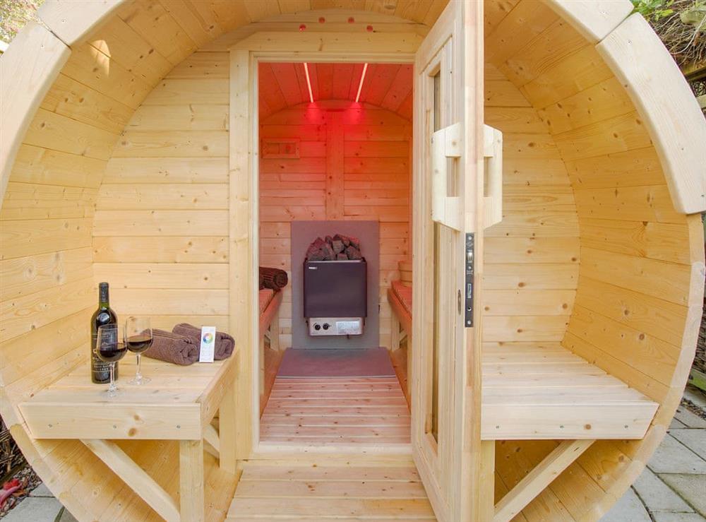 Relaxing barrel-style Swedish sauna at Oak Cottage, 