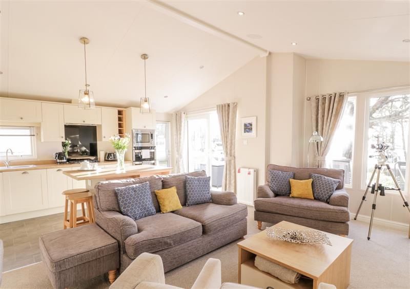 Relax in the living area at Serenity Lodge, Wemyss Bay