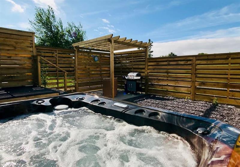 Enjoy the hot tub in the Cader Idris at Seven Springs in Llanon, Mid Wales
