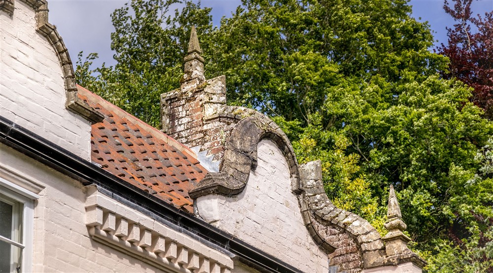 Decorative roof details are in the neo-Jacobean style at Sexton's Lodge in Norwich, Norfolk