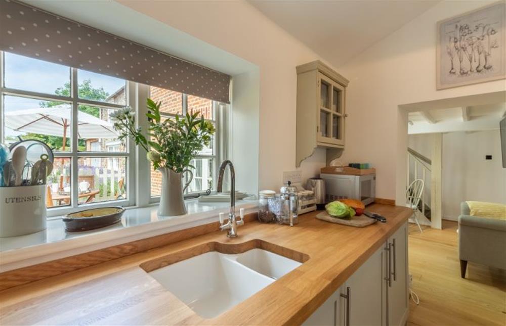 Ground floor: Kitchen units feature wooden work tops at Sextons Yard Cottage, Docking near Kings Lynn