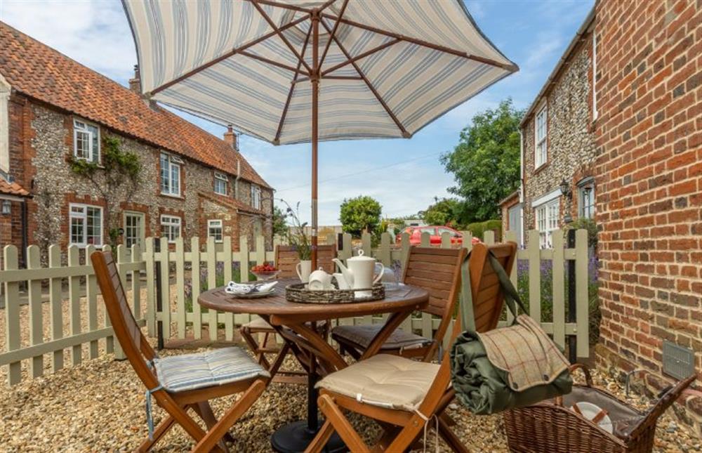 The enclosed courtyard garden is perfect for dogs and young children at Sextons Yard Cottage, Docking near Kings Lynn