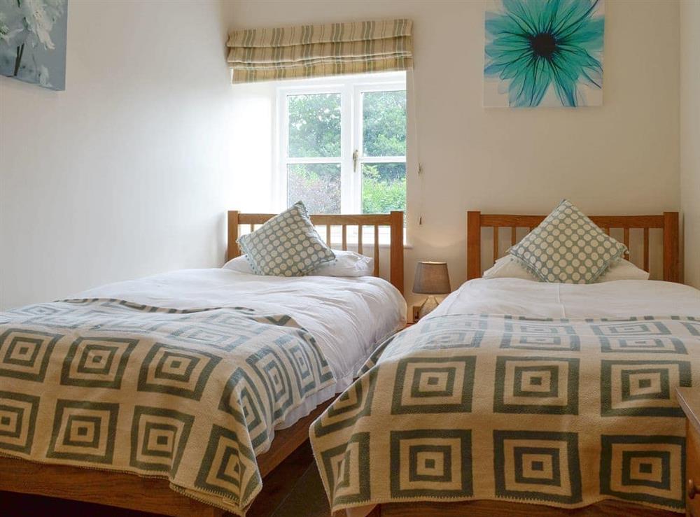 Cosy twin bedroom at Sgubor Ucha in Llanrhychwyn, Trefriw, Gwynedd