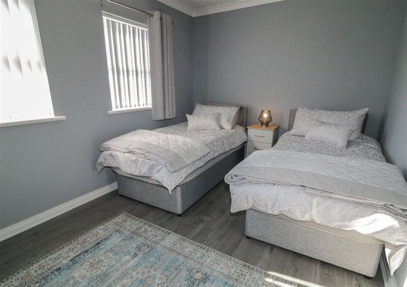 This is a bedroom (photo 3) at Shalom Apartment 100A, Markethill