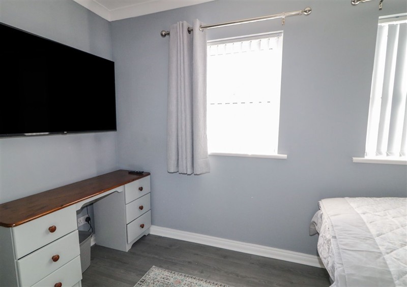 This is a bedroom (photo 4) at Shalom Apartment 100A, Markethill