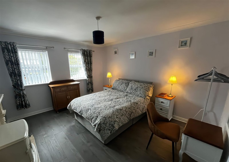 This is a bedroom at Shalom Apartment 98B, Markethill