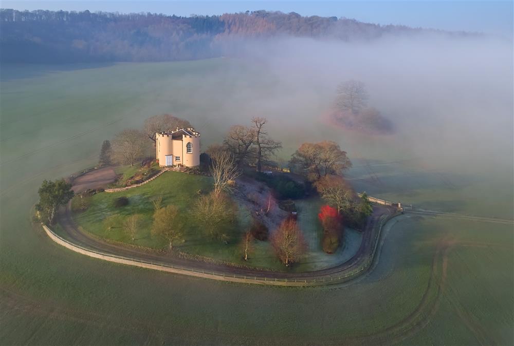 Magical Sham Castle, shrouded in mist at Sham Castle, Acton Burnell