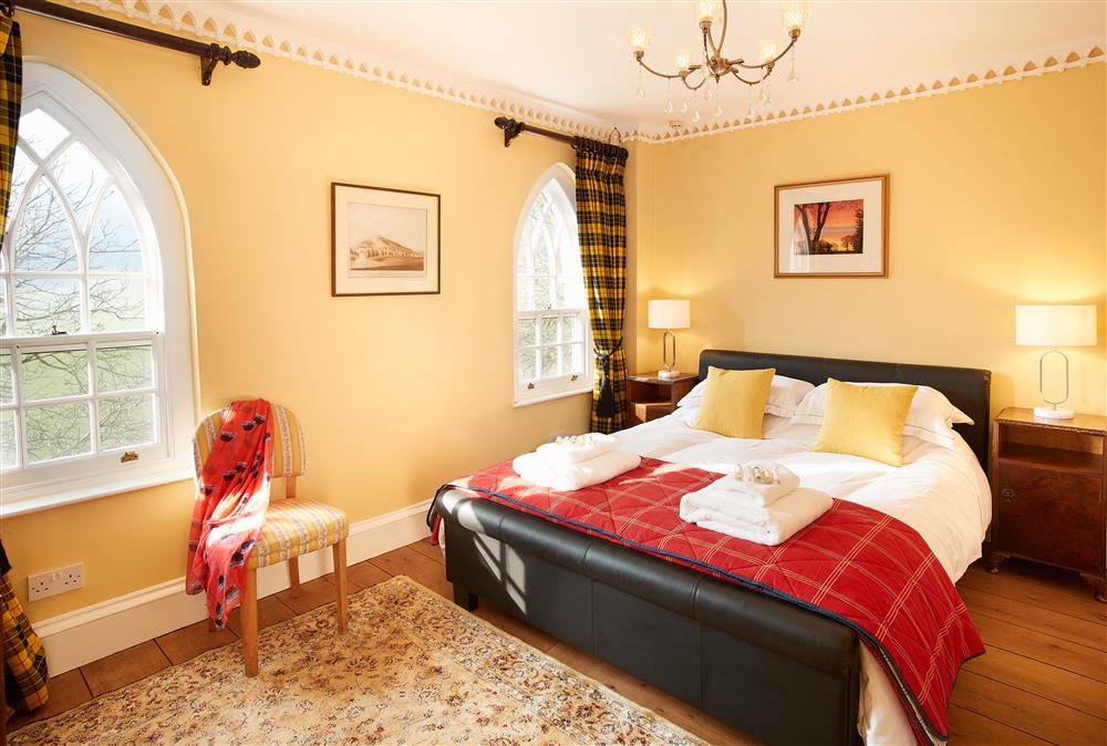 The impressive master bedroom with a 5’ king-size sleigh bed at Sham Castle, Acton Burnell