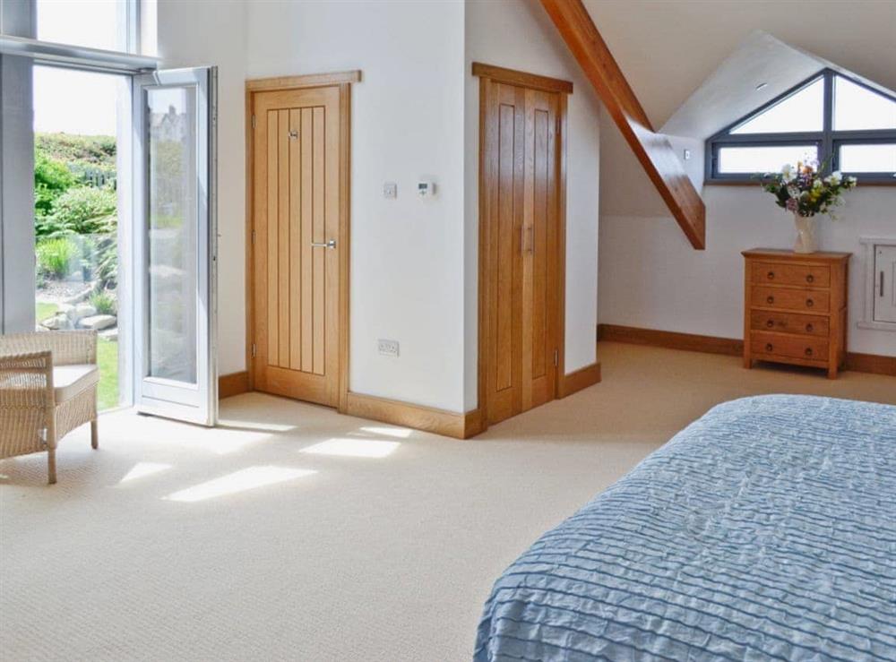 Charming double bedroom with juliet balcony at Shark’s Fin in Sennen, S. Cornwall., Great Britain