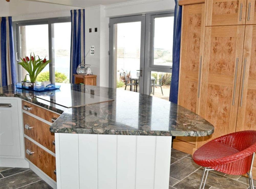 Stylish kitchen with ocean views at Shark’s Fin in Sennen, S. Cornwall., Great Britain