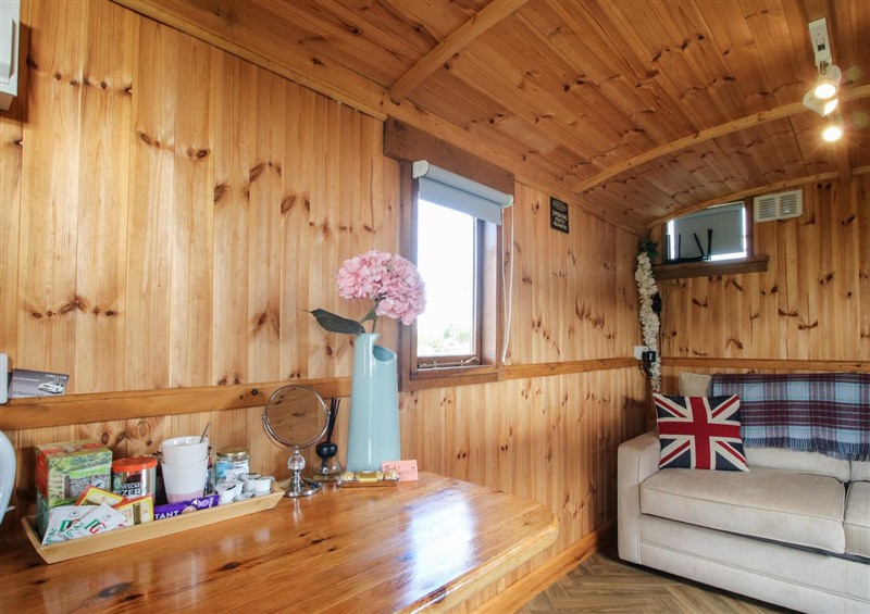 Relax in the living area at Sharons Shepherd Hut, Knockin