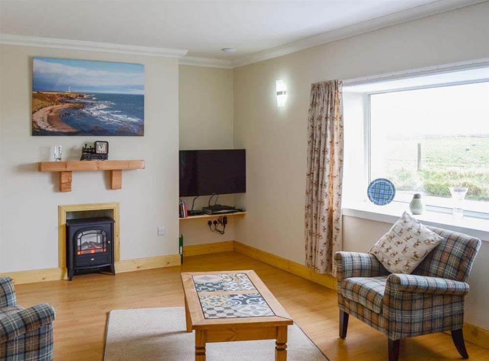 Bright and inviting living room at Sheaf Dale in Portmahomack, near Tain, Northern Highlands, Ross-Shire