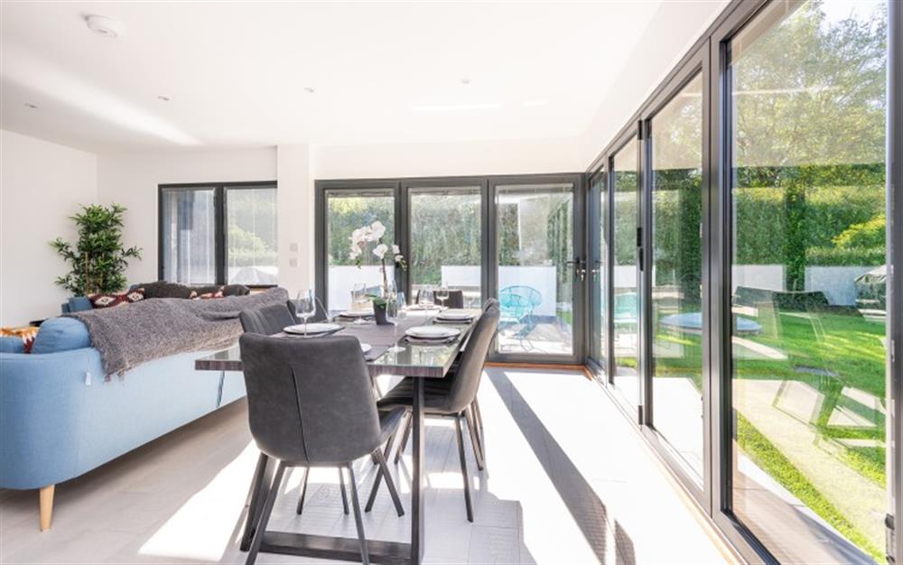 Dining area with bifolds doors at Shearlangstone Barn in Kingston