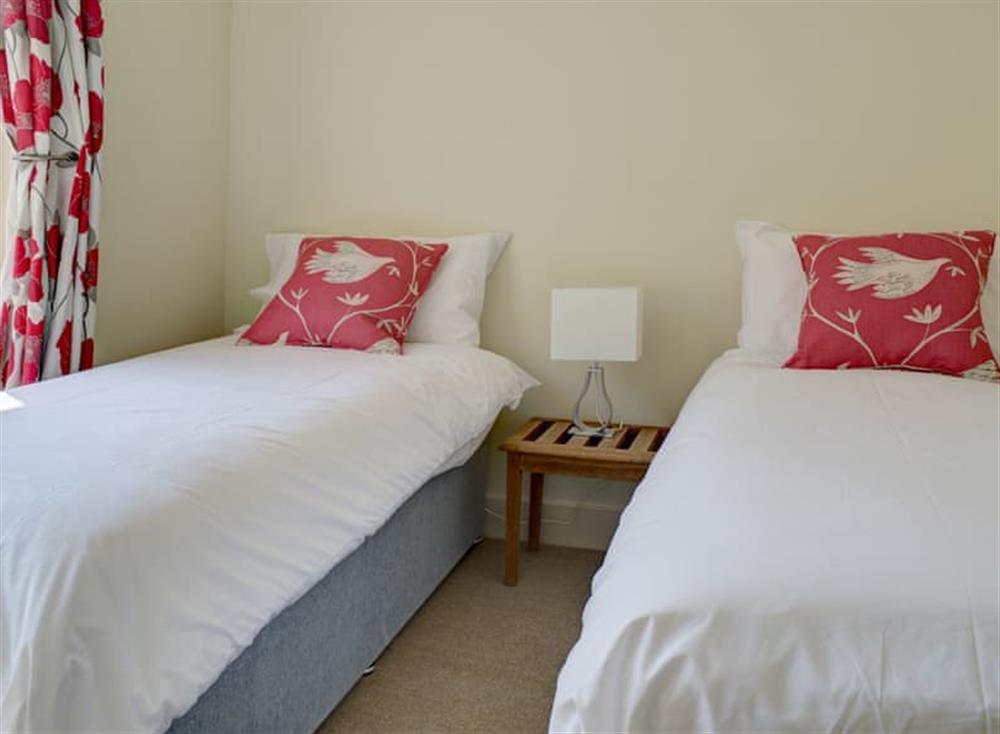 Twin bedroom at Shearwater Lake House in Cotswold Lakes, Gloucestershire