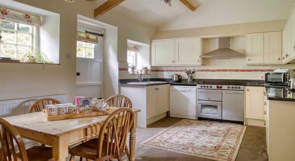 Interior kitchen and dining area of Shedbush Farmhouse, nr Bridport, Dorset at Shedbush Farm House in Nr Bridport, Dorset