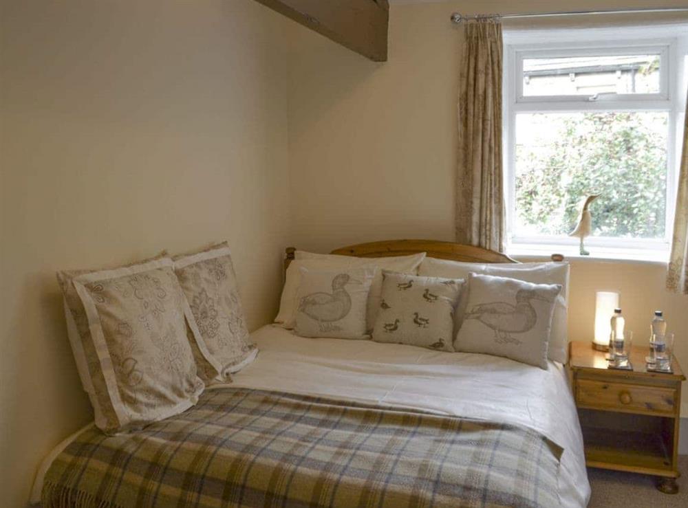 Comfortable double bedroom at Shelduck Cottage in Holmfirth, West Yorkshire