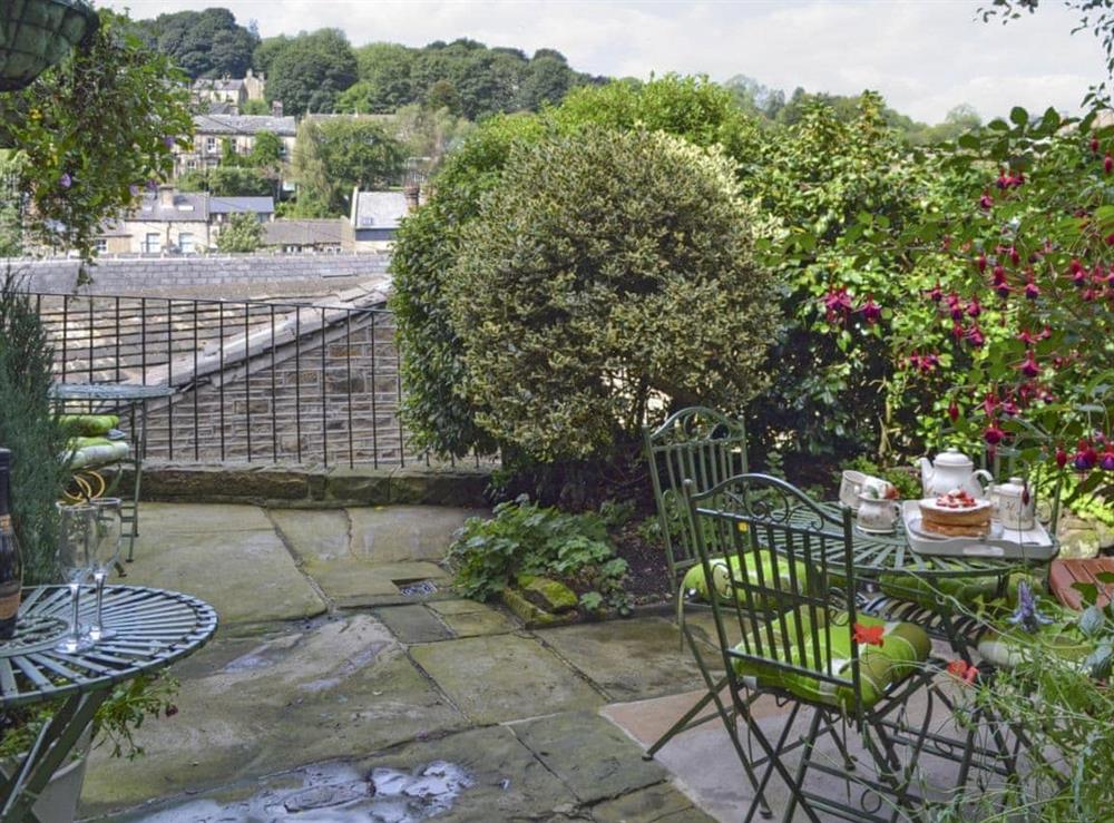 Great views over the village from the courtyard at Shelduck Cottage in Holmfirth, West Yorkshire